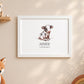 A framed personalized art print featuring a watercolor illustration of a baby cow with the name 'AIMEE' and the date '06.08.