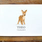 A personalized watercolor art print featuring a young brown spotted deer standing on a white textured background, with the name 'THEO' and the date '03.09.