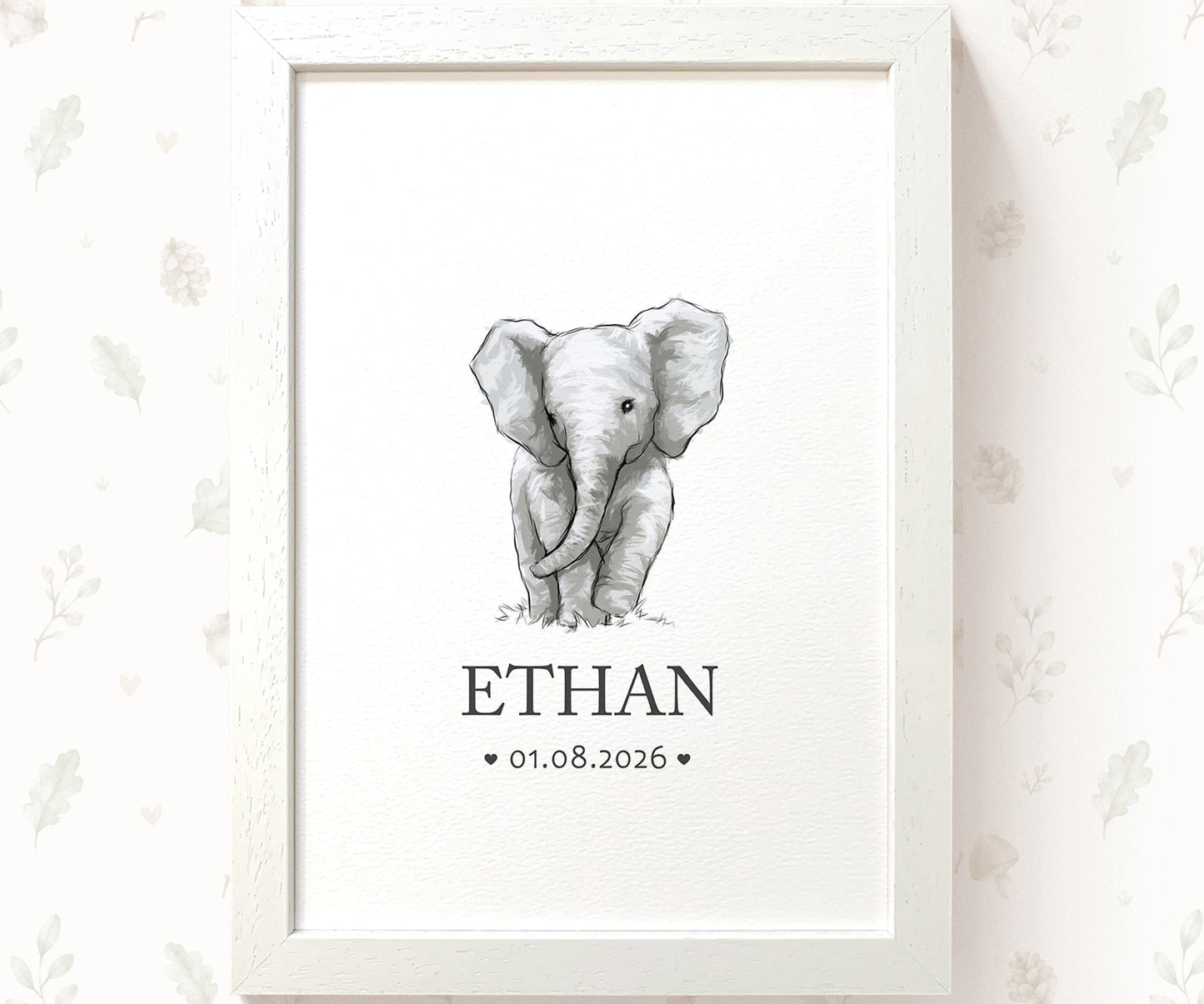 A framed personalized baby elephant art print featuring a black and white sketch of a baby elephant with the name 'ETHAN' and date '01.08.